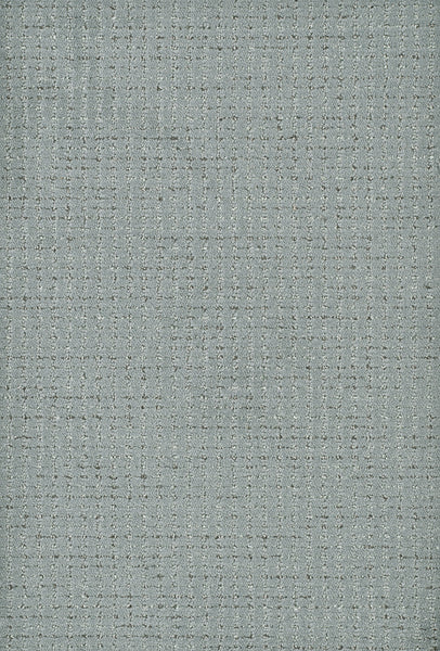 Chalet On Trend Carpet features a light blue-gray textured fabric with a subtle grid pattern and woven appearance, offering a soft, neutral tone inspired by luxurious carpet design.
