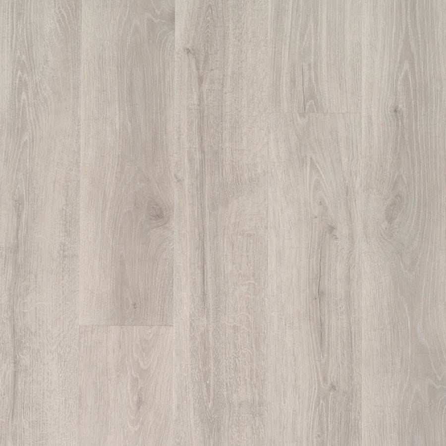 Antique Style 9 7/16" Waterproof Laminate in Cotton Knit Oak features light gray tones, a smooth finish, and vertical wood grain patterns for a clean, modern, and contemporary appearance.