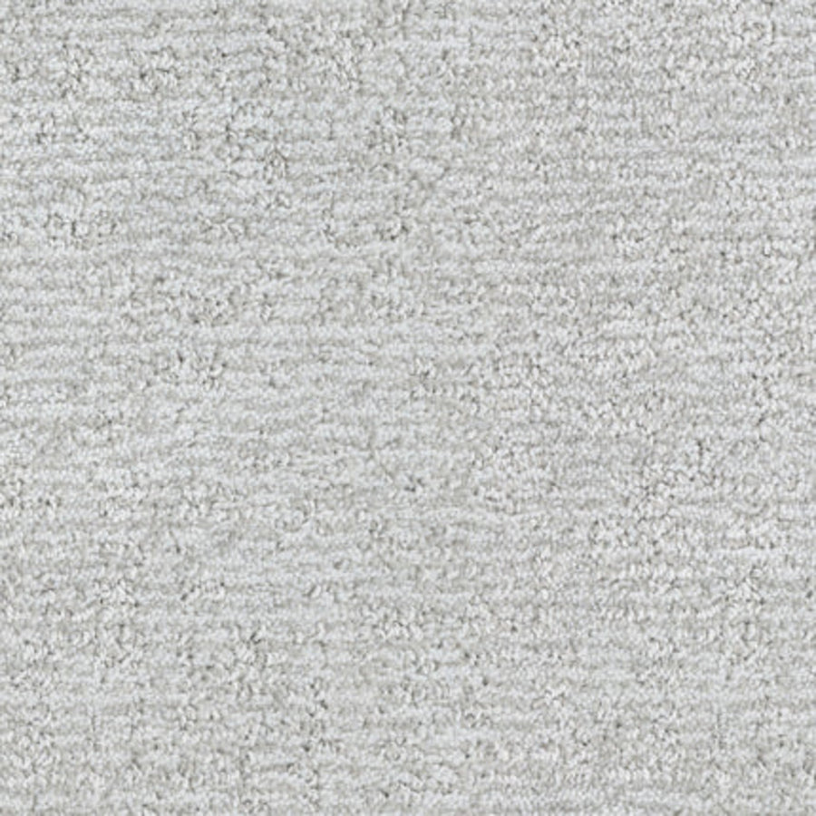 Close-up of Balance Family Friendly Carpet in Cozy—light grey, durable, and soft with a plush, slightly uneven looped surface—great for busy homes.