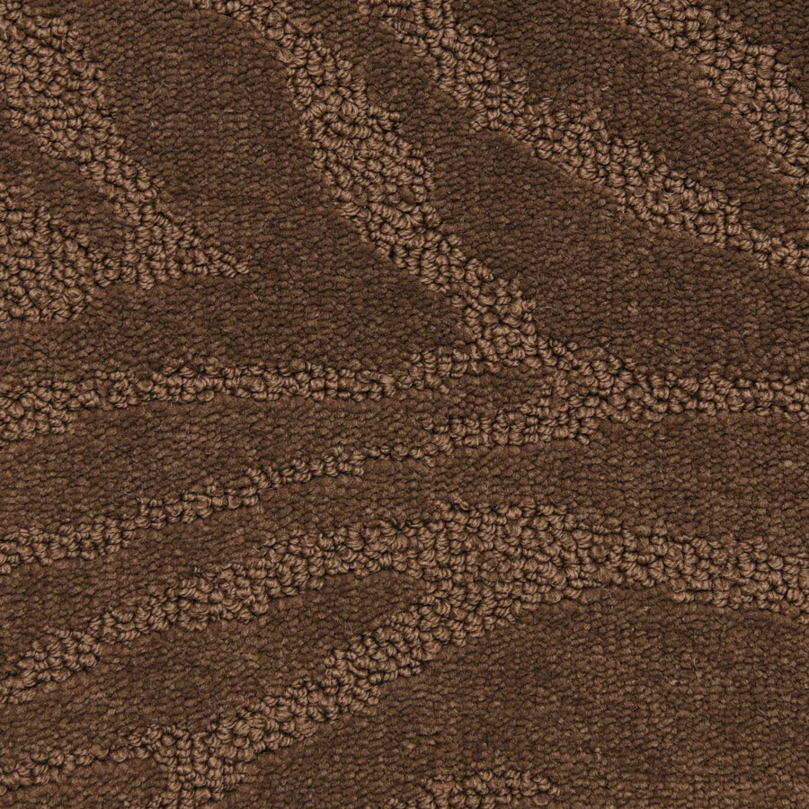 Close-up of Capetown On Trend Carpet in Cricket, showcasing brown textured luxury with subtle wavy patterns and a raised abstract design—crafted from looped and cut fibers, ideal for high-traffic areas.