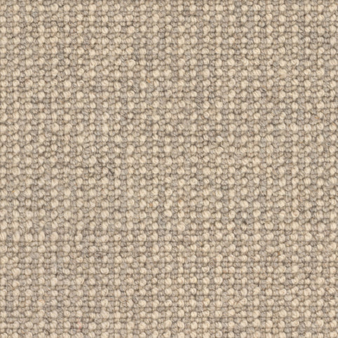 Close-up of Andros Berber Carpet in Cyclades color, highlighting its textured, woven grid pattern and sturdy surface reminiscent of premium Berber carpet construction.