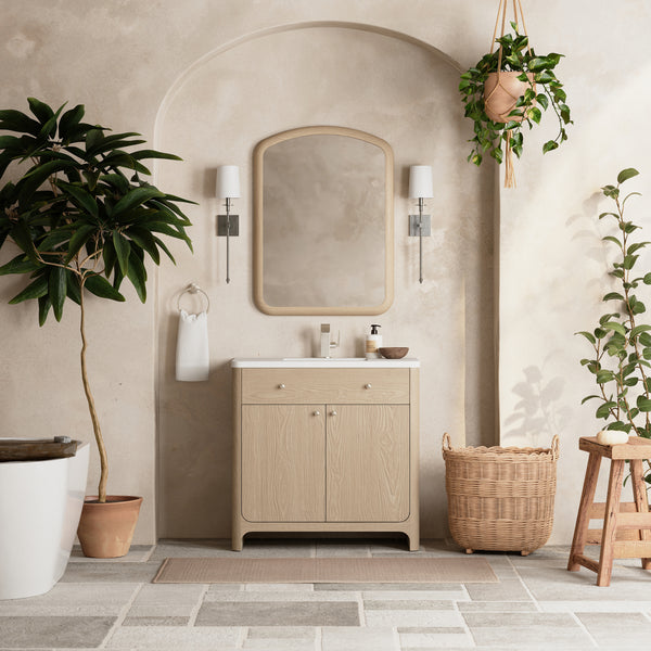 A minimalist bathroom showcases the Gracyn 36