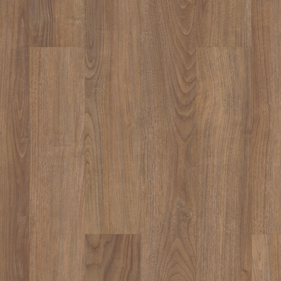 Close-up view of Coretec Originals Classics Vinyl, showcasing a natural brown wooden surface with visible grain patterns and subtle knots, offering smooth texture and realistic wood visuals reminiscent of luxury flooring.