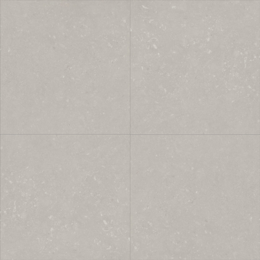 Four light gray Coretec Solid Polymer Core Vinyl Tile pieces with subtle speckles and faint grout lines form a grid. The slightly textured, stone-like surface offers durable flooring with the luxurious look of quality vinyl tile.