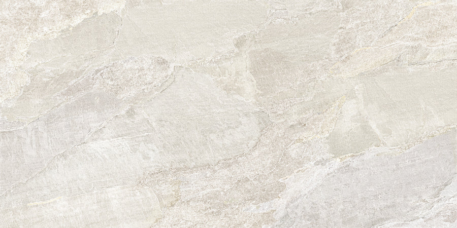Montagna 12x24 Porcelain Tile features light beige and gray tones with subtle, irregular stone patterns, gentle veining, and a slightly textured surface—perfect for durable floors with authentic slate-inspired style.