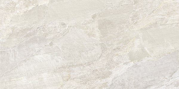 Montagna 12x24 Porcelain Tile features light beige and gray tones with subtle, irregular stone patterns, gentle veining, and a slightly textured surface—perfect for durable floors with authentic slate-inspired style.