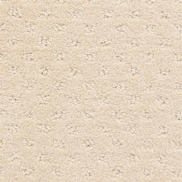 Close-up of Dreamer On Trend Carpet in Daffodil, showcasing plush beige fibers with a subtle dotted pattern and evenly spaced raised tufts—an inviting choice for luxury flooring.