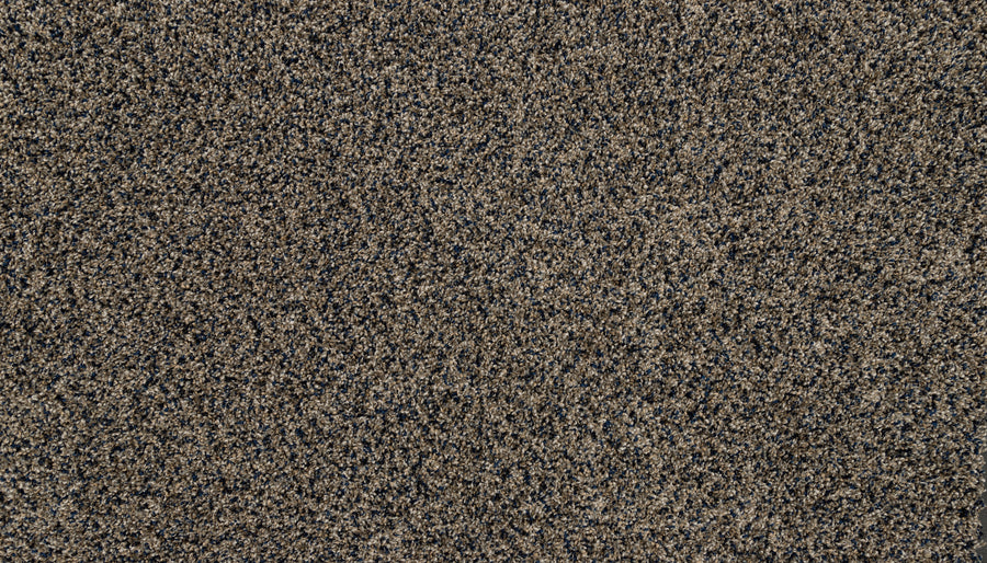 Close-up of the Furocious I Pet Friendly Carpet, featuring tightly woven, plush brown and gray fibers. The textured surface appears uniform throughout, with no visible patterns or objects in sight.