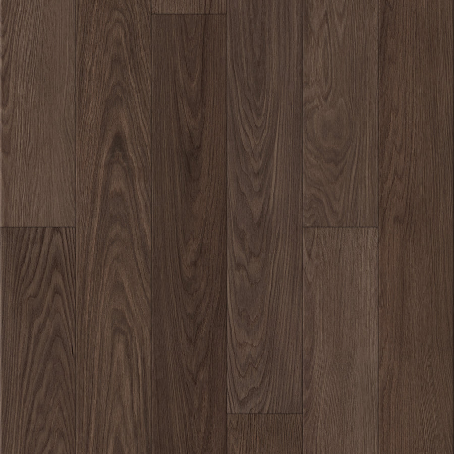 Close-up of Coretec Lakehouse Luxe 7.09" Vinyl Plank in Deep Saddle Walnut, showcasing dark brown tones with visible natural grain and subtle variations for an authentic hardwood look.