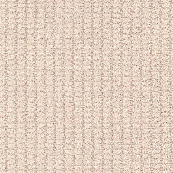 Close-up of the Defined Family Friendly Carpet in light beige, featuring a soft, textured grid pattern formed by raised vertical and horizontal lines. This carpet offers luxurious comfort and superior quality for your home.