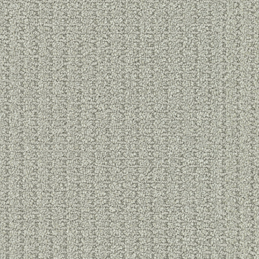 Close-up of Defined Family Friendly Carpet in light gray, showcasing a subtle grid pattern and tightly woven, high-quality fibers for a luxuriously soft surface.