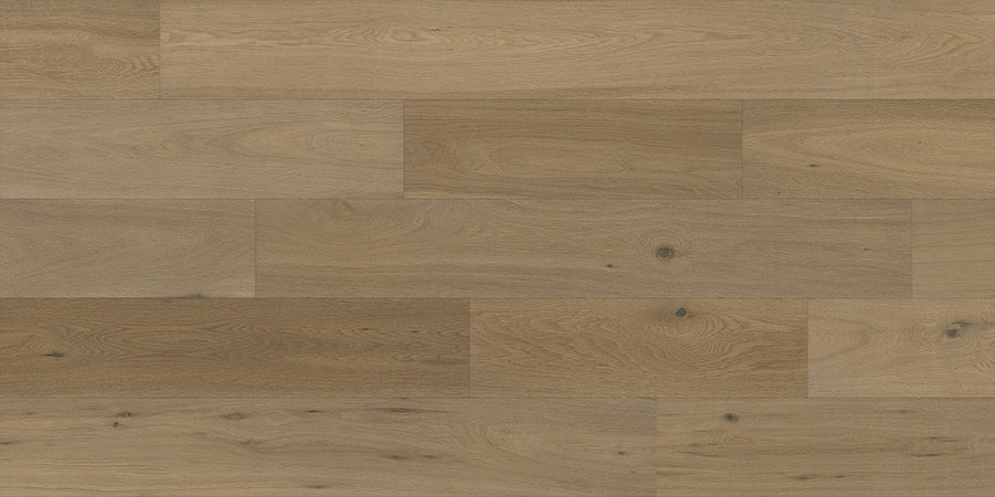 Denali II 7 1/2" Hardwood in Pinnacle offers wide planks of light brown wood showcasing natural grain patterns and knots, finished with an oiled matte surface for a subtle, rustic look with gently varied shades.