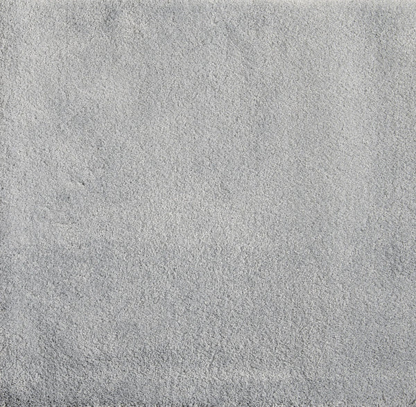A close-up of Cha Cha On Trend Carpet in Denim shows a soft, textured surface with subtle shading and mottled detail—ideal for contemporary spaces and high-traffic areas.