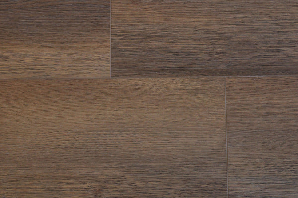 Close-up view of dark brown wooden floor planks with visible grain patterns and subtle seams between each plank.