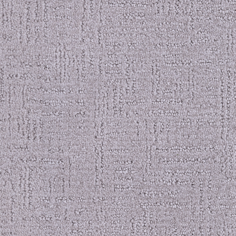 Close-up of the Distinctive Family Friendly Carpet in light gray, featuring a subtle grid of raised rectangular shapes. Its soft, plush Envision nylon texture makes it ideal for modern home decor and family spaces.