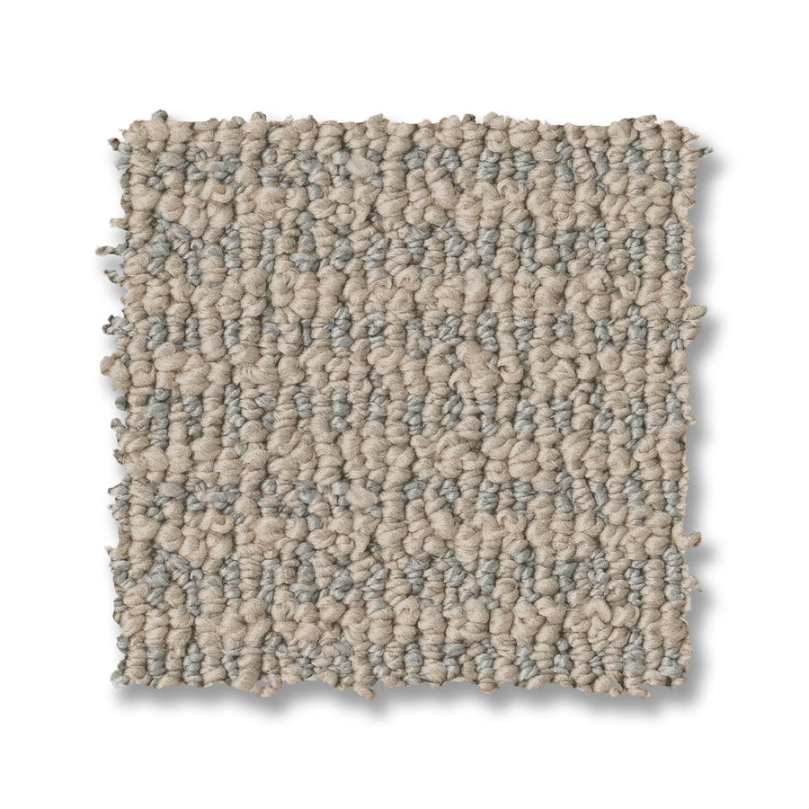 A square sample of Laine On Trend Carpet displays a beige and light gray looped pattern, highlighting its textured design on a white background.