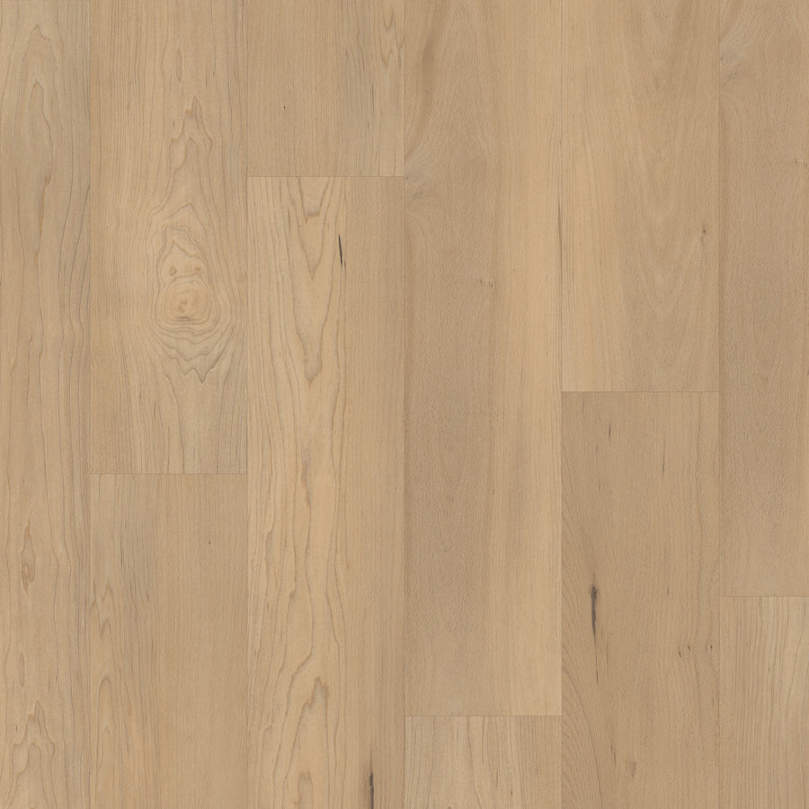 Coretec Pro Plus HD 7" Vinyl Plank features light tones with natural grain and knots in a staggered layout. Its smooth matte finish and waterproof durability create a warm, inviting look with subtle variations for any space.