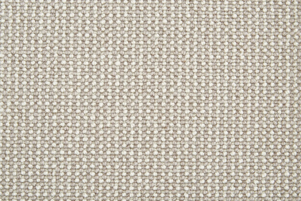 Close-up of Harper Berber Carpet in Dove color, showing its grid-like woven texture. The tightly knit fibers provide everyday durability and a sturdy surface, making it ideal for long-lasting comfort.