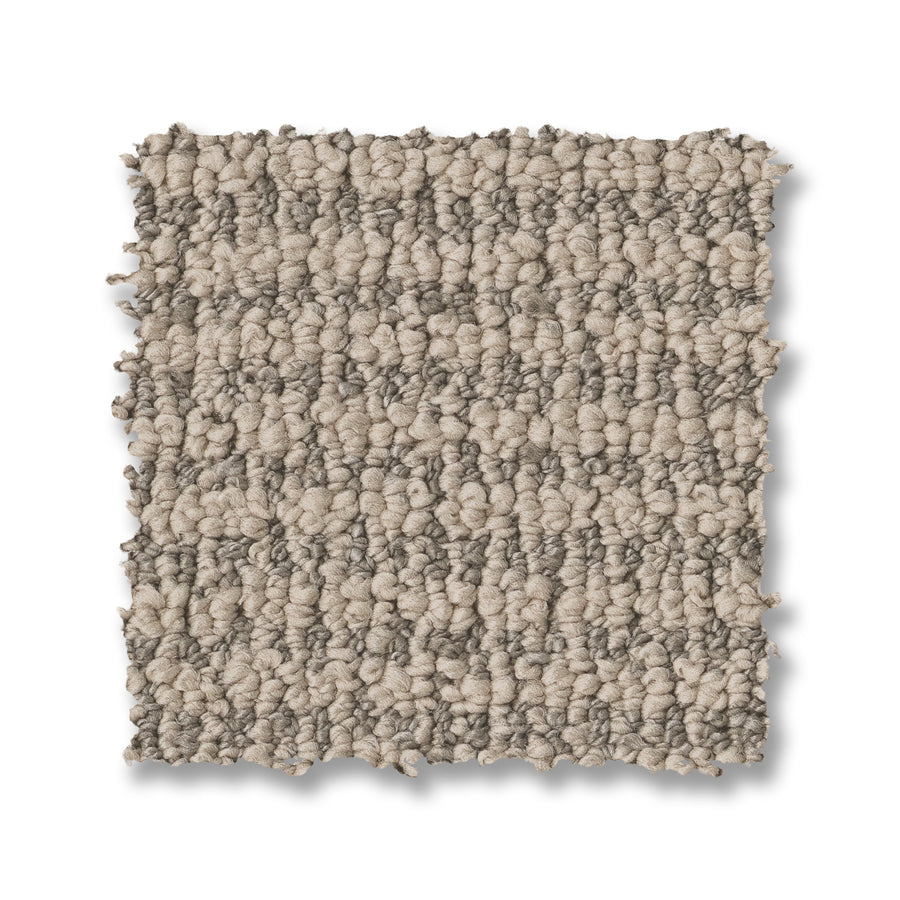 A rectangular swatch of Laine On Trend Carpet in textured beige and light brown loop pile, shown on a white background.