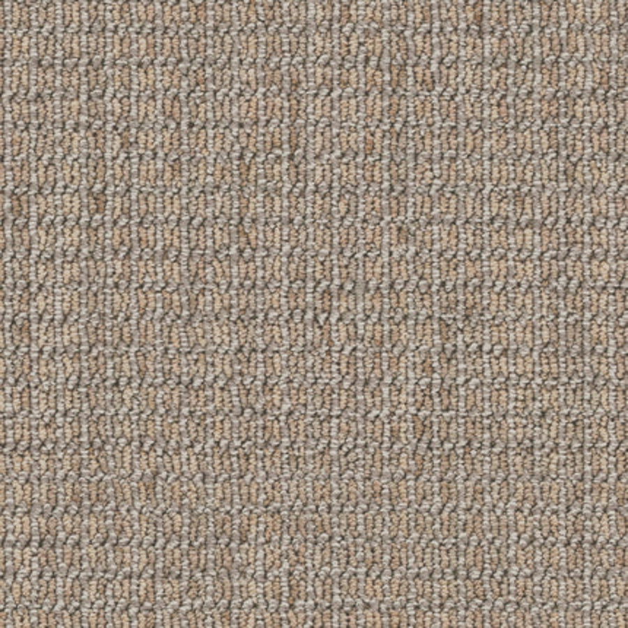 Close-up of Haven Berber Carpet in Driftwood, featuring tightly looped fibers in beige and light brown. Its woven texture and stain resistance make it a practical, neutral choice for busy spaces.