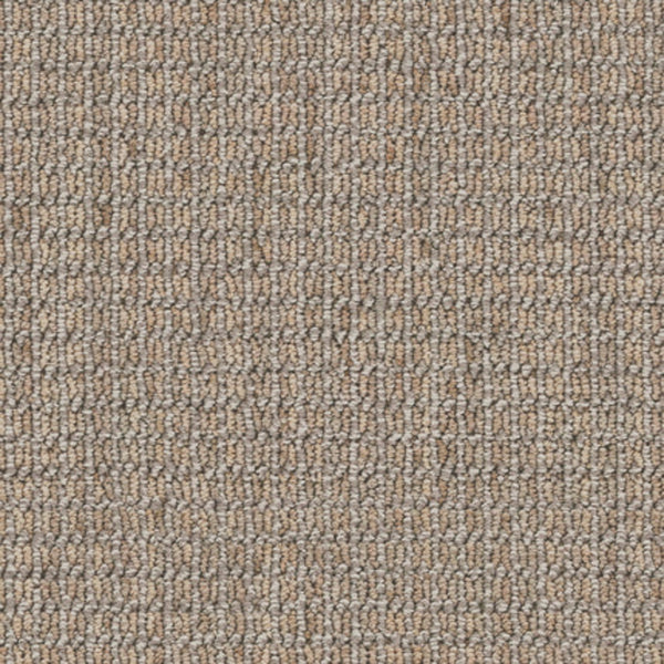 Close-up of Haven Berber Carpet in Driftwood, featuring tightly looped fibers in beige and light brown. Its woven texture and stain resistance make it a practical, neutral choice for busy spaces.