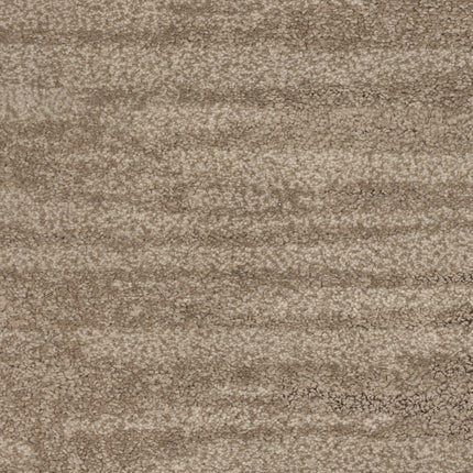 Close-up of Cirrus Berber Carpet in Driftwood, showcasing its beige hue, textured surface, subtle horizontal patterns, and soft plush appearance.