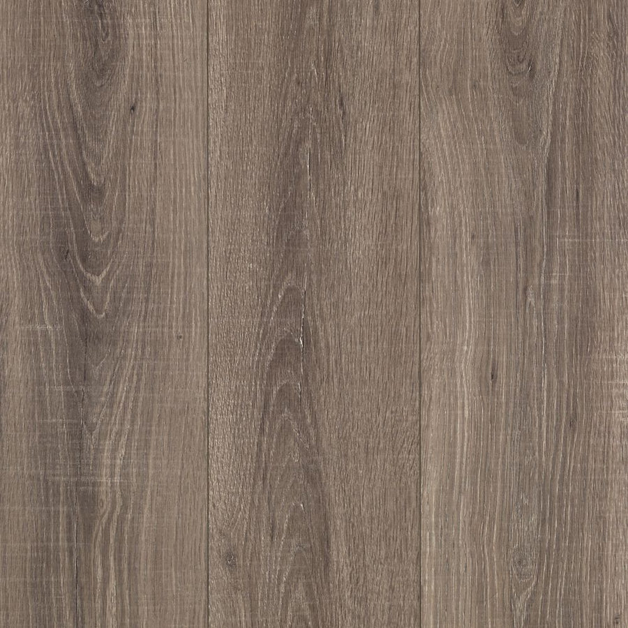 Close-up of Rare Vintage 7 1/2" Waterproof Laminate in Driftwood Oak, showcasing natural brown tones with visible wood grain and subtle color variations for a luxurious flooring look.