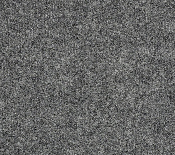 A close-up of the Windsurf Pet Friendly Carpet in Drizzle shows its soft, dense gray fabric with a subtle mottled and speckled pattern, blending comfort with a modern look.