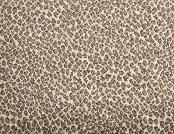 Close-up of Serengeti On Trend Carpet in Dune, showcasing a brown and beige leopard print with irregular spots—an ideal choice for adding a contemporary touch to your space.