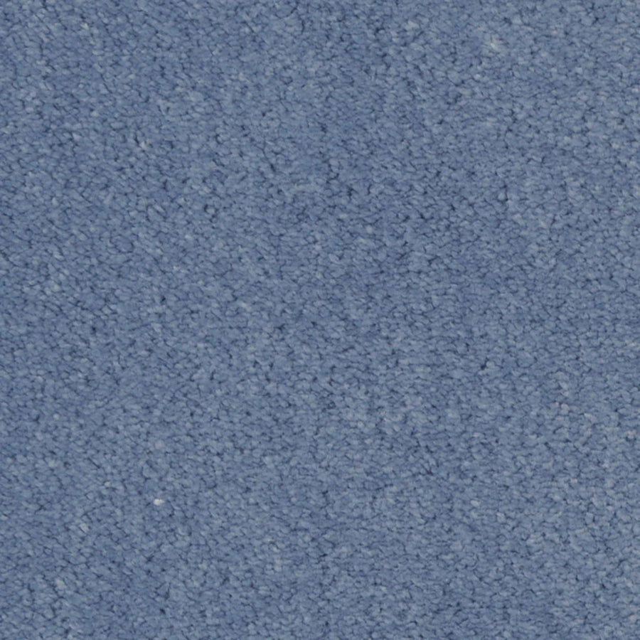 Close-up of the Seduction On Trend Carpet in Dusk, featuring a textured surface with small, tightly-packed fibers and a consistent blue hue for an elegant appearance.