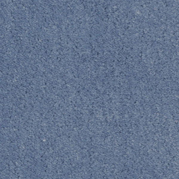 Close-up of the Seduction On Trend Carpet in Dusk, featuring a textured surface with small, tightly-packed fibers and a consistent blue hue for an elegant appearance.