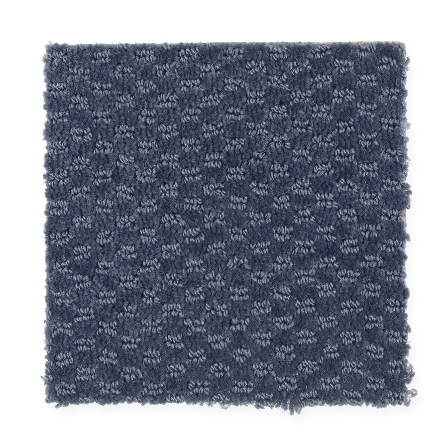 A square swatch of Dynamo Family Friendly Carpet in Night Navy, featuring a textured, durable surface with a subtle repeating raised dot pattern and slightly uneven edges.