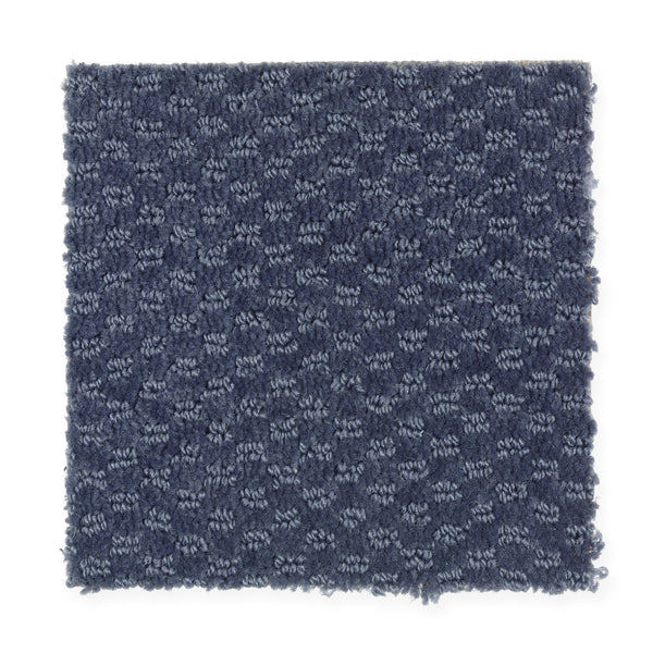 A square swatch of Dynamo Family Friendly Carpet in Night Navy, featuring a textured, durable surface with a subtle repeating raised dot pattern and slightly uneven edges.