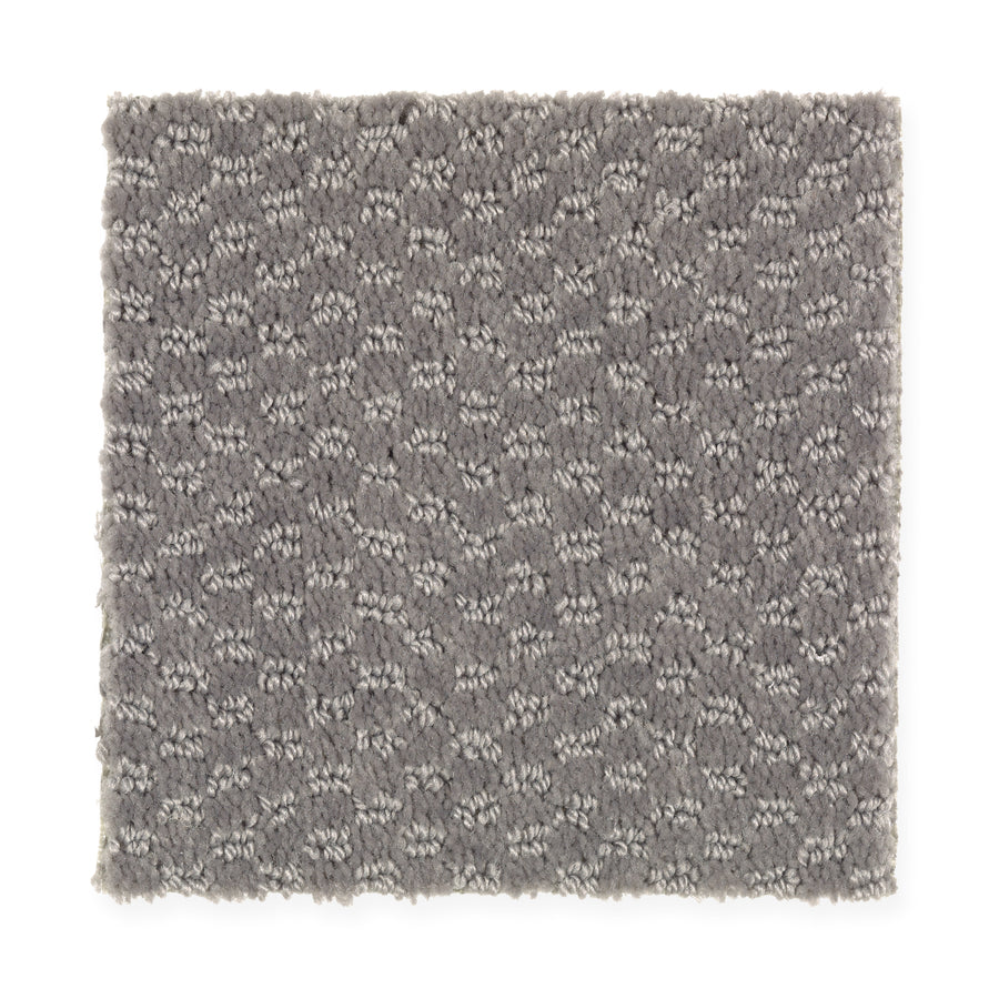 A square sample of Dynamo Family Friendly Carpet in Ancient Marble, featuring a textured gray tone and subtle repeating looped pattern on a white background.
