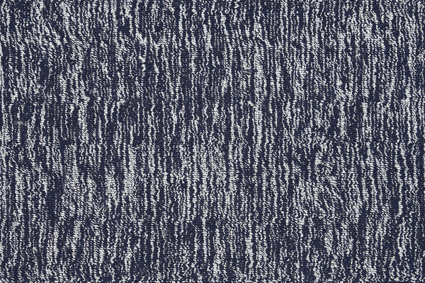 Close-up of the Effervescense On Trend Carpet in Ink, showing its luxurious, contemporary textured surface with vertical dark blue and white stripes for a modern woven effect.