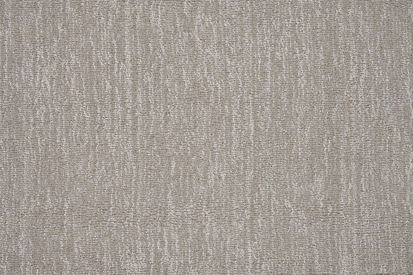 Close-up view of the Effervescense On Trend Carpet in Mist, showcasing a luxurious, contemporary look with its soft, textured pattern of lighter and darker fibers for a subtly wavy effect.