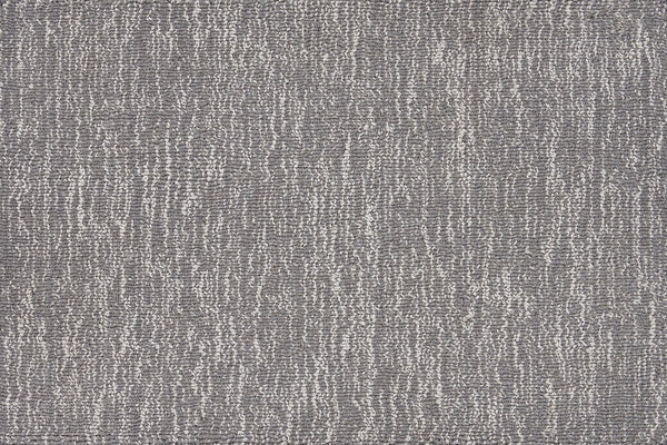 Close-up of the Effervescense On Trend Carpet in Steel—its textured gray surface features an abstract linear pattern in light and dark shades, making it perfect for modern, contemporary interiors.