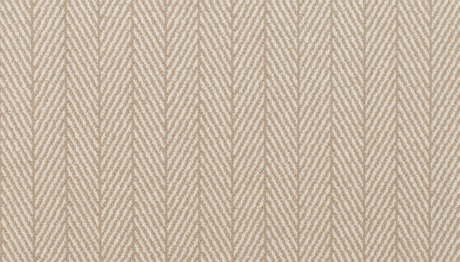 The Eastleigh Berber Carpet in Truffle features a textured, geometric chevron herringbone pattern. Durable and stylish, it’s ideal for high-traffic areas with its signature series of angled V shapes.
