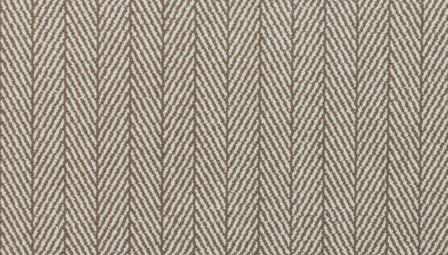Close-up of Eastleigh Berber Carpet in Pecos, featuring a beige and cream herringbone pattern with V-shaped zigzags. The soft, woven texture makes it an ideal choice for enhancing high-traffic spaces.