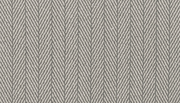 Close-up of Eastleigh Berber Carpet in Pewter, showcasing a light gray and white herringbone pattern with zigzag lines—perfect for high-traffic areas or as inspiration for luxurious carpet designs.