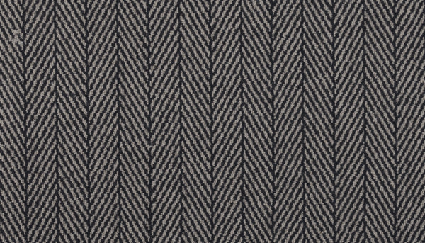 Close-up of the Eastleigh Berber Carpet in Filigree, showcasing a luxurious herringbone pattern in gray and black with repeating V-shaped lines—ideal for adding stylish durability to high-traffic areas.