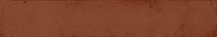 The Eclipse 2x18 Glazed Porcelain Tile features a brown architectural surface with small dots, providing a premium tile appearance.