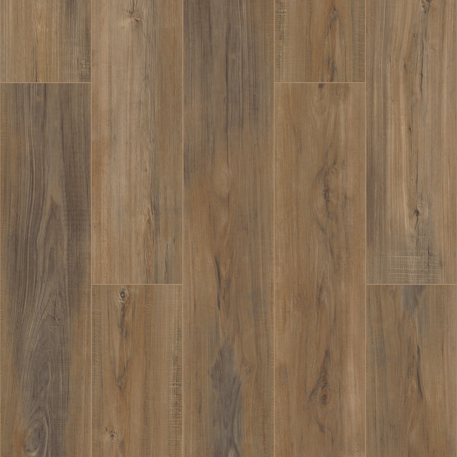 A close-up of Coretec Pro Plus Enhanced Vinyl flooring, featuring wooden planks in varied brown shades with visible grain and natural knots, arranged in a staggered pattern.