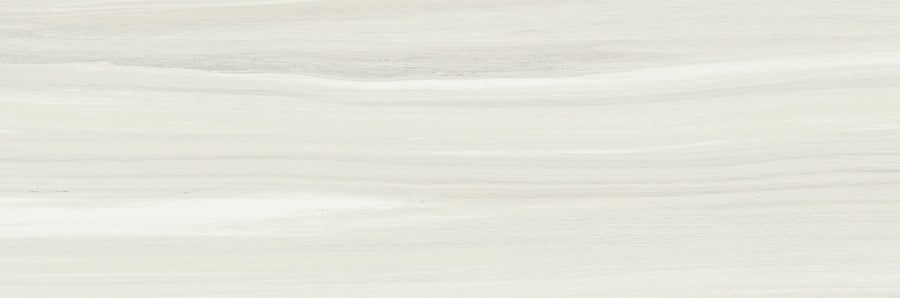 The Element 10x30 Glossy Tile features a light gray and white marble texture with subtle horizontal veining, delivering a smooth, refined look that pairs beautifully with neutral tiles or natural wood grain accents.