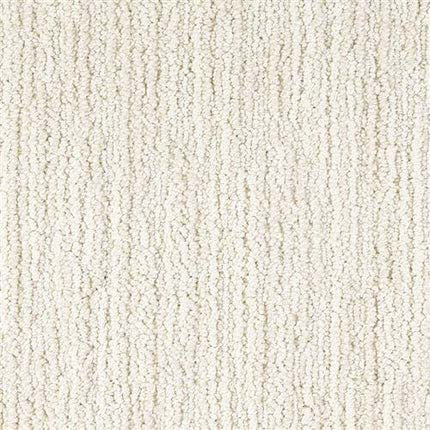 Close-up of Advocate Berber Carpet in Elite color, featuring a light beige, looped pile with vertical rows. Its premium Berber weave creates a durable, soft texture for lasting comfort and style.