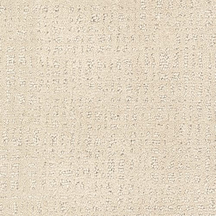 Homage Berber Carpet in Escapade features a beige textured fabric with subtle, irregular dotted and dashed patterns. Its classic, neutral design is understated and ideal for upholstery or high-traffic areas.