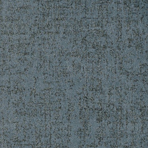 Close-up of Hollywood Nights On Trend Carpet in Evening Sky—a textured blue-gray carpet with a subtle, irregular geometric pattern and a mottled look that pairs contemporary style with premium durability.