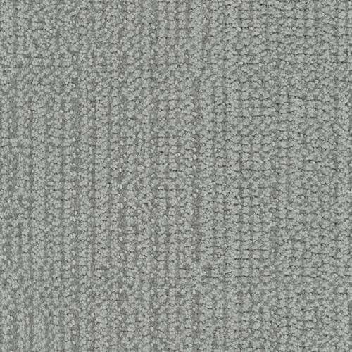 Close-up of Occasion On Trend Carpet in Event color, showing its gray textured surface with a subtle linear pattern and small, tightly woven loops for a soft, uniform look.