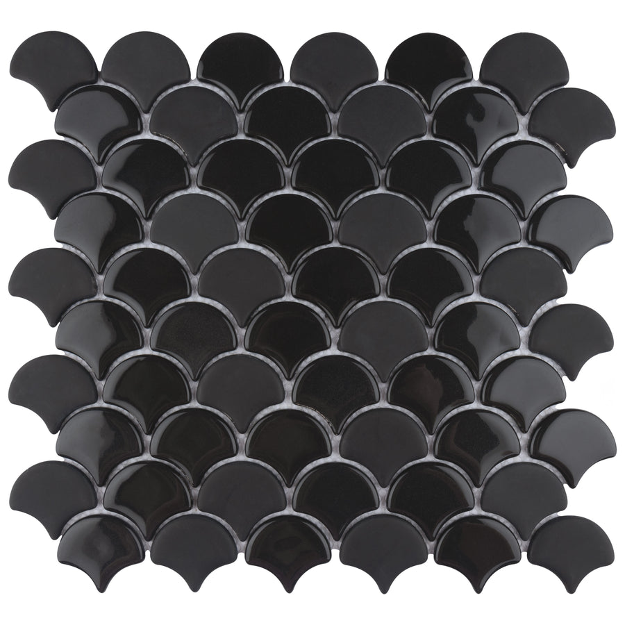 The Escala Mosaic Ceramic Tile features black, glossy, fan-shaped pieces arranged in an overlapping scallop pattern on a white background.