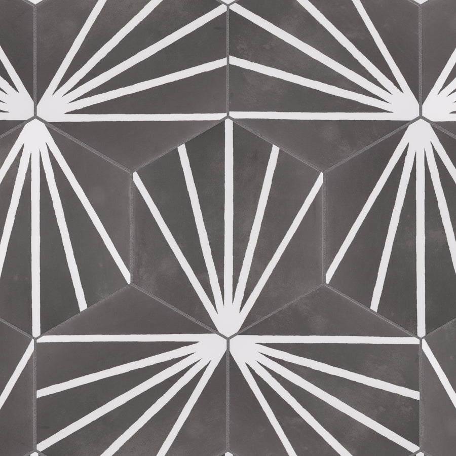 Geometric tile pattern with dark hexagons featuring white, radiating lines forming fan shapes at each corner, creating a repeating, symmetrical design.